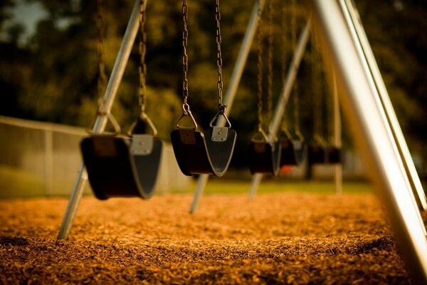 Summer is over. Empty swing