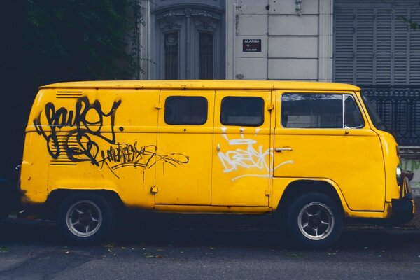 Yellow traced micro-bus near the memorial