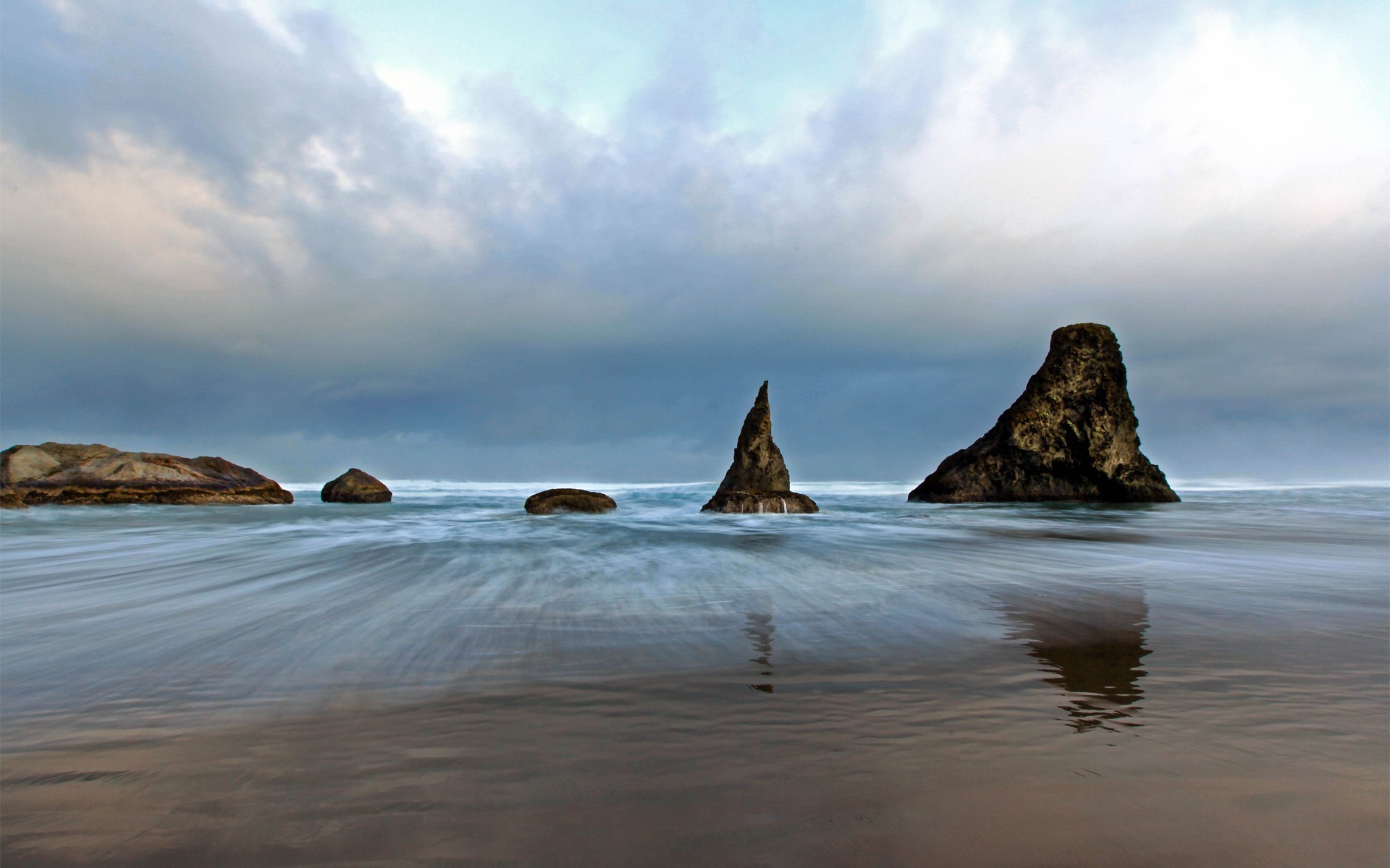 felsen felsbrocken und steine felsbrocken und steine wasser sonnenuntergang meer ozean strand meer abend landschaft dämmerung dämmerung winter landschaft himmel reisen schnee im freien rock brandung