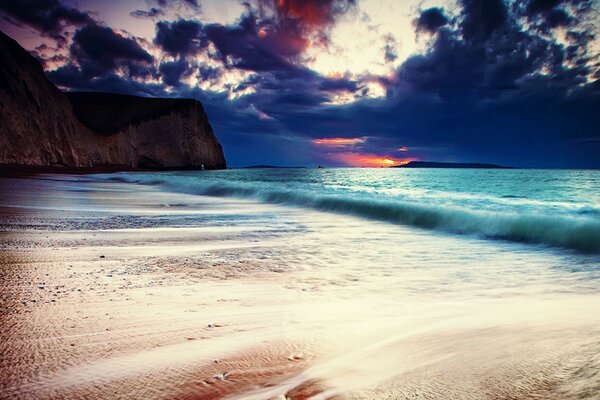 Sea surf on a deserted beach