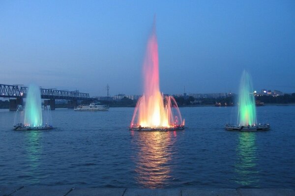 Wontans with backlight. Light-music. City fountains