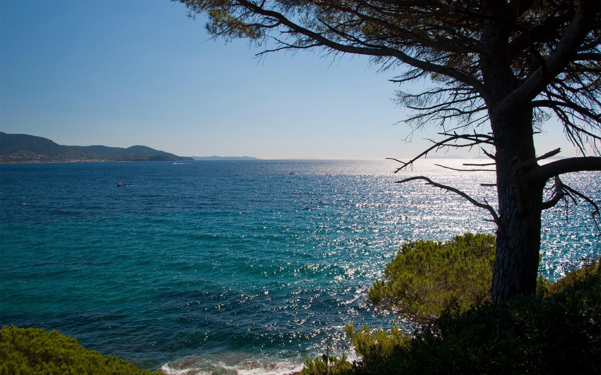 sea and ocean landscape water tree nature seashore sea beach travel sky lake ocean scenic outdoors dawn sunset summer sun island mountain