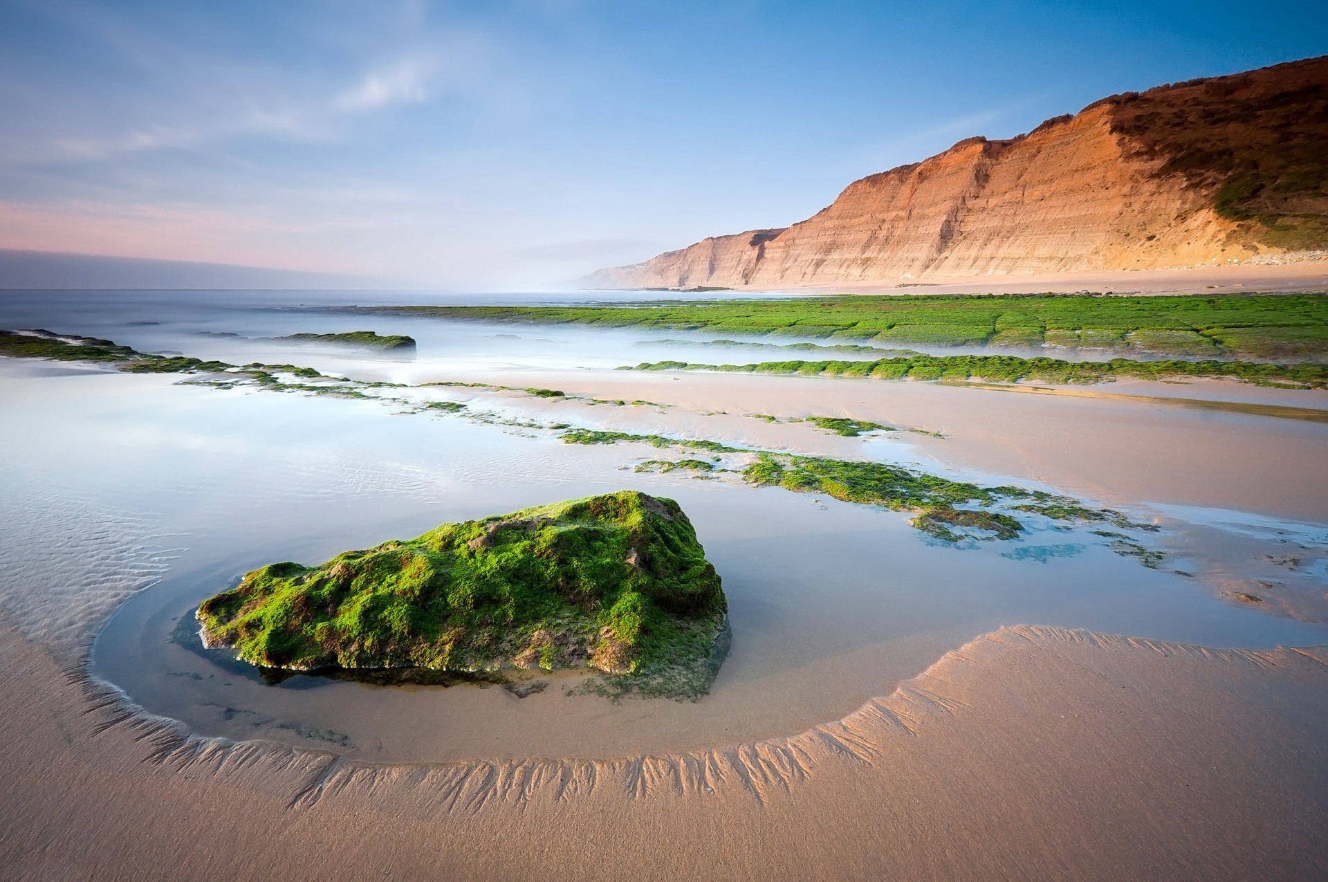 rocks boulders and stones water landscape beach seashore sand travel sea ocean seascape sky sunset nature scenic dawn outdoors island rock