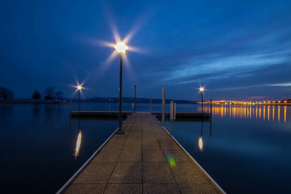 Evening lanterns by the water in the city