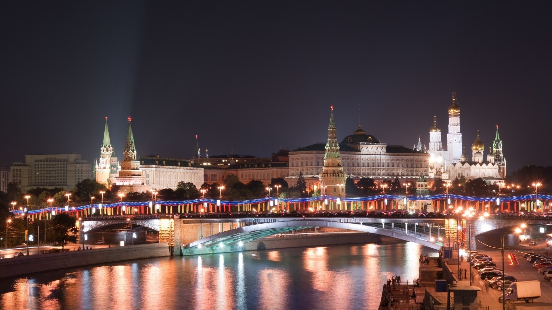 city travel water dusk architecture evening sunset illuminated river bridge outdoors reflection sky building