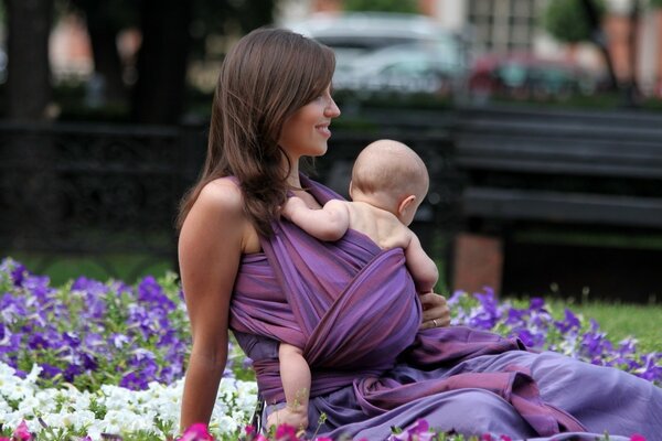 Mother and child on a carpet of bright colors