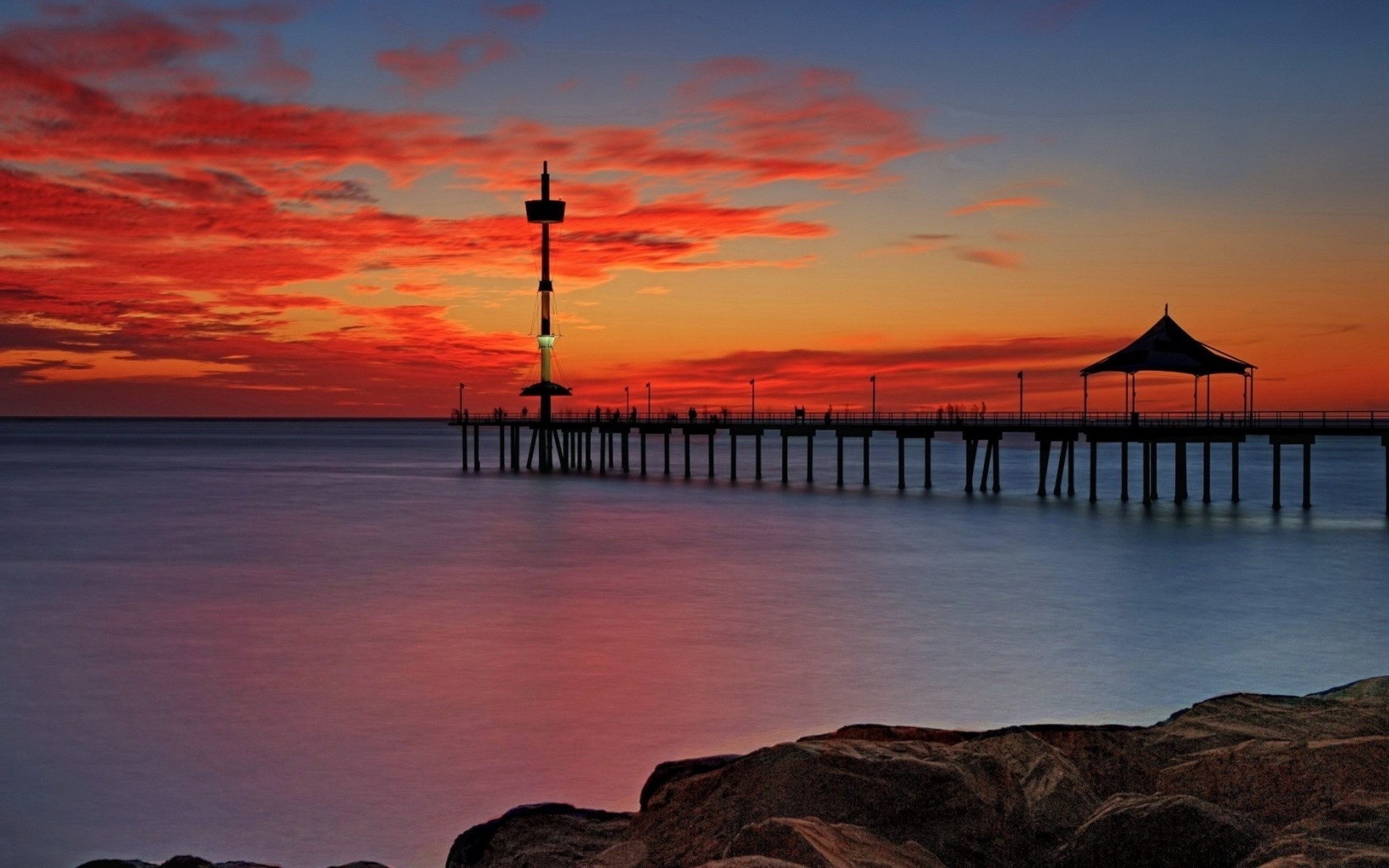 sea and ocean sunset water beach dawn sea ocean seashore dusk evening sun seascape sky reflection pier travel