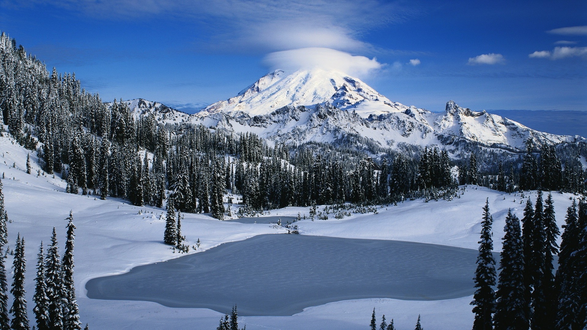 lake snow mountain winter cold mountain peak evergreen wood scenic ice snowy alpine landscape conifer pinnacle resort snowcapped