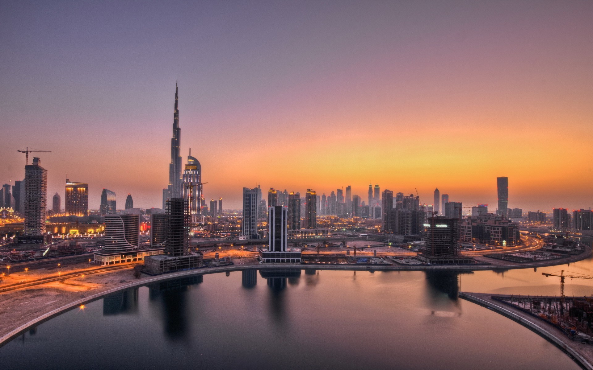 city architecture skyline sunset downtown dusk cityscape skyscraper travel river water sky bridge office building evening dawn tower business