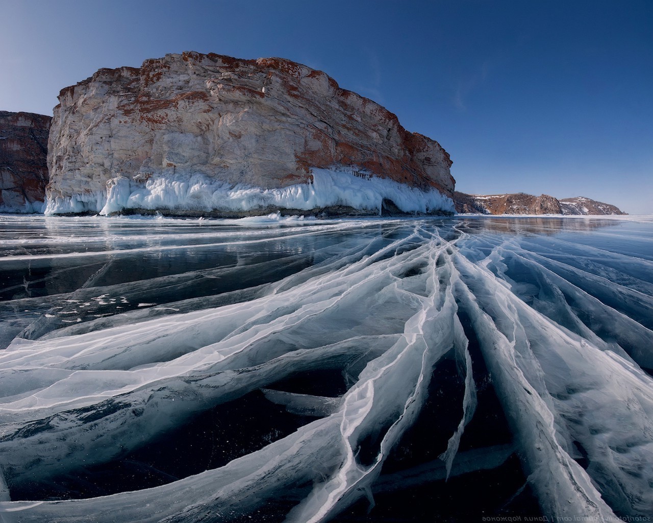 lake landscape ice nature snow sky water winter travel rock sea cold scenic mountain dawn ocean