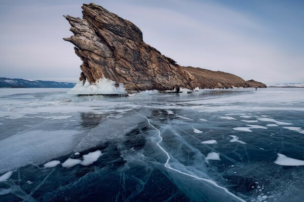 A rock stuck in the ocean ice