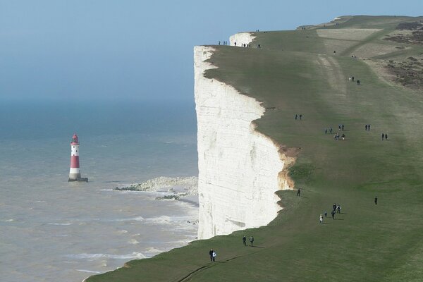 View from the mountains to the lighthouse in the sea