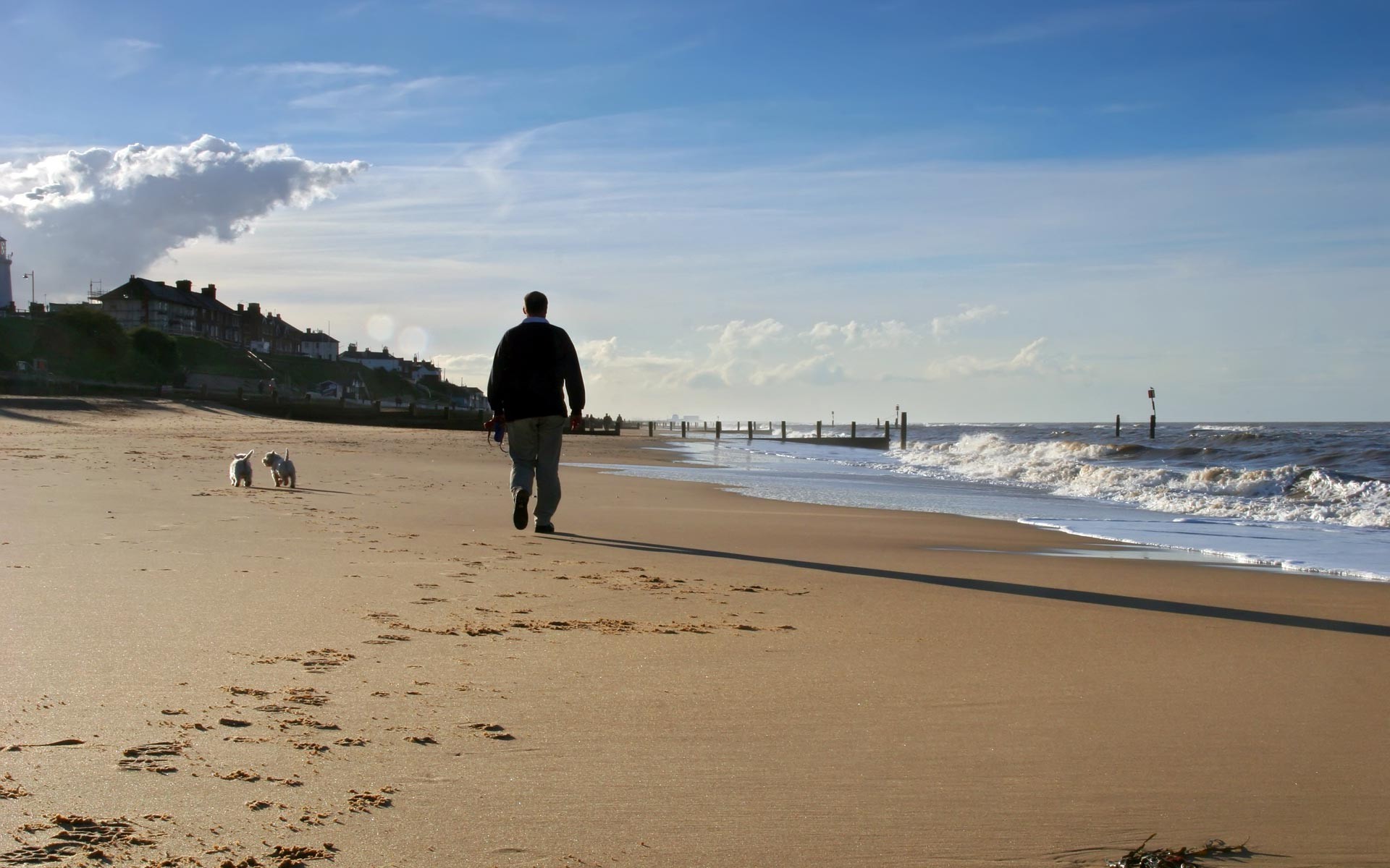 sea and ocean beach water sand seashore sea ocean landscape travel surf sky sun daylight outdoors