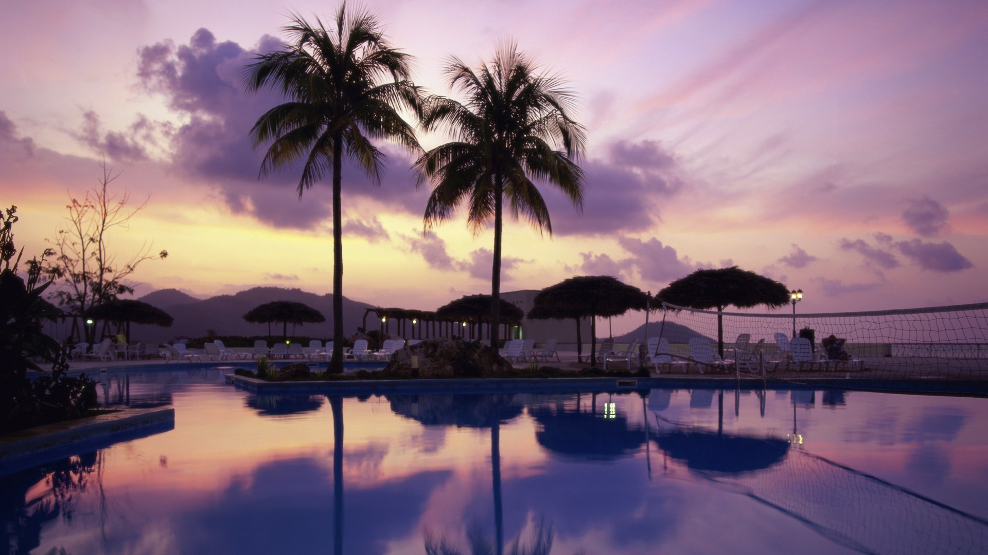 meer und ozean strand wasser sonnenuntergang tropisch sonne ozean meer palmen reflexion dämmerung reisen sommer exotisch insel resort meer holz sand bucht paradies