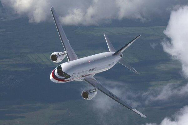 A passenger plane soaring in the sky