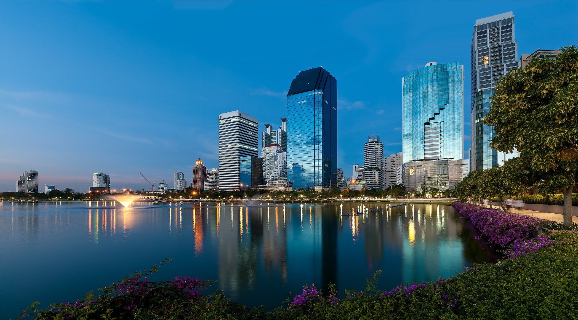 skyscrapers city skyline skyscraper architecture cityscape downtown reflection office building modern river urban sky waterfront water dusk business travel tower harbor