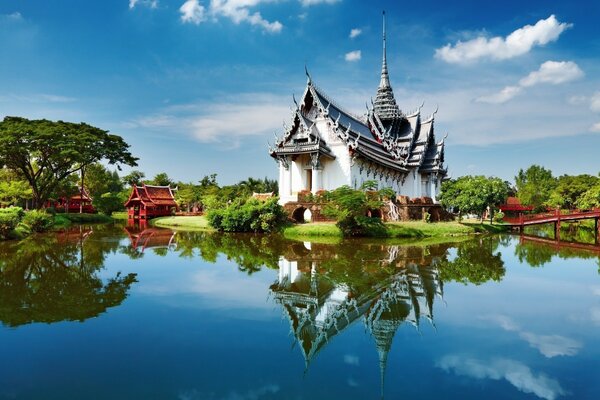 An ancient building near the river in the summer