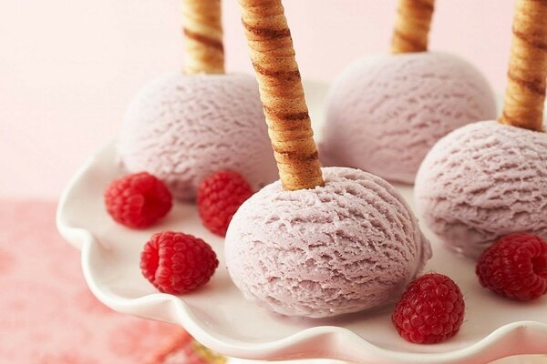 Raspberry ice cream on a plate