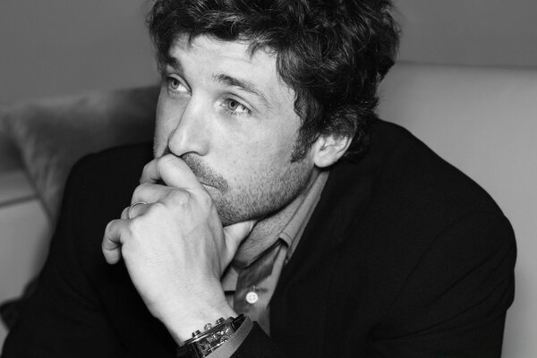 Black and white photo of a man in meditation