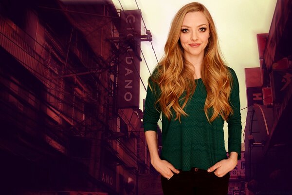 Amanda Seyfried on the background of the city