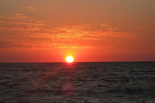 Red sunset in the ocean