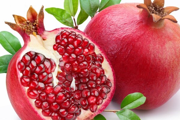 Cut pomegranate fruit with seeds