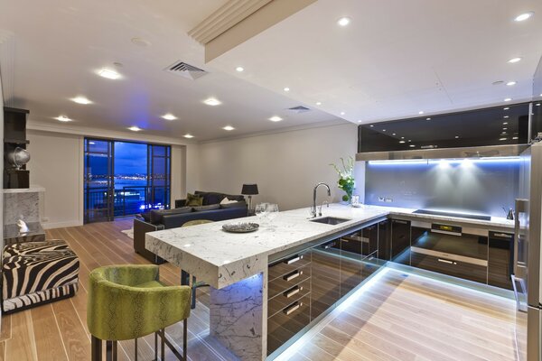 Huge kitchen with stone slab furniture