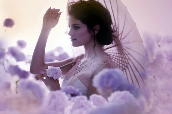 Gentle portrait of a girl with an umbrella