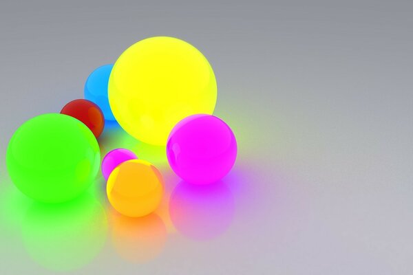 Bright colored balls on a soft surface