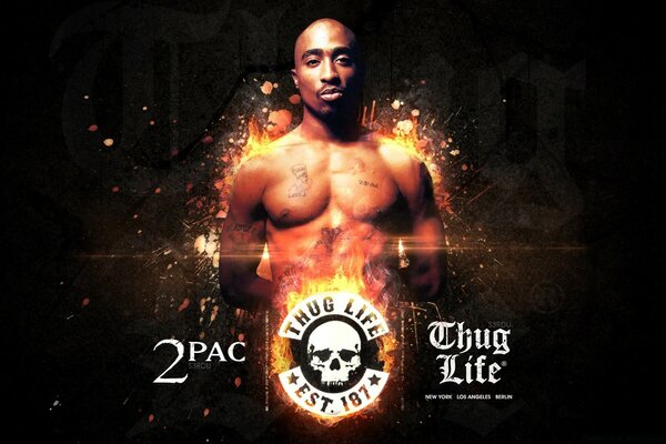 Rapper 2pac on a black background with a skull