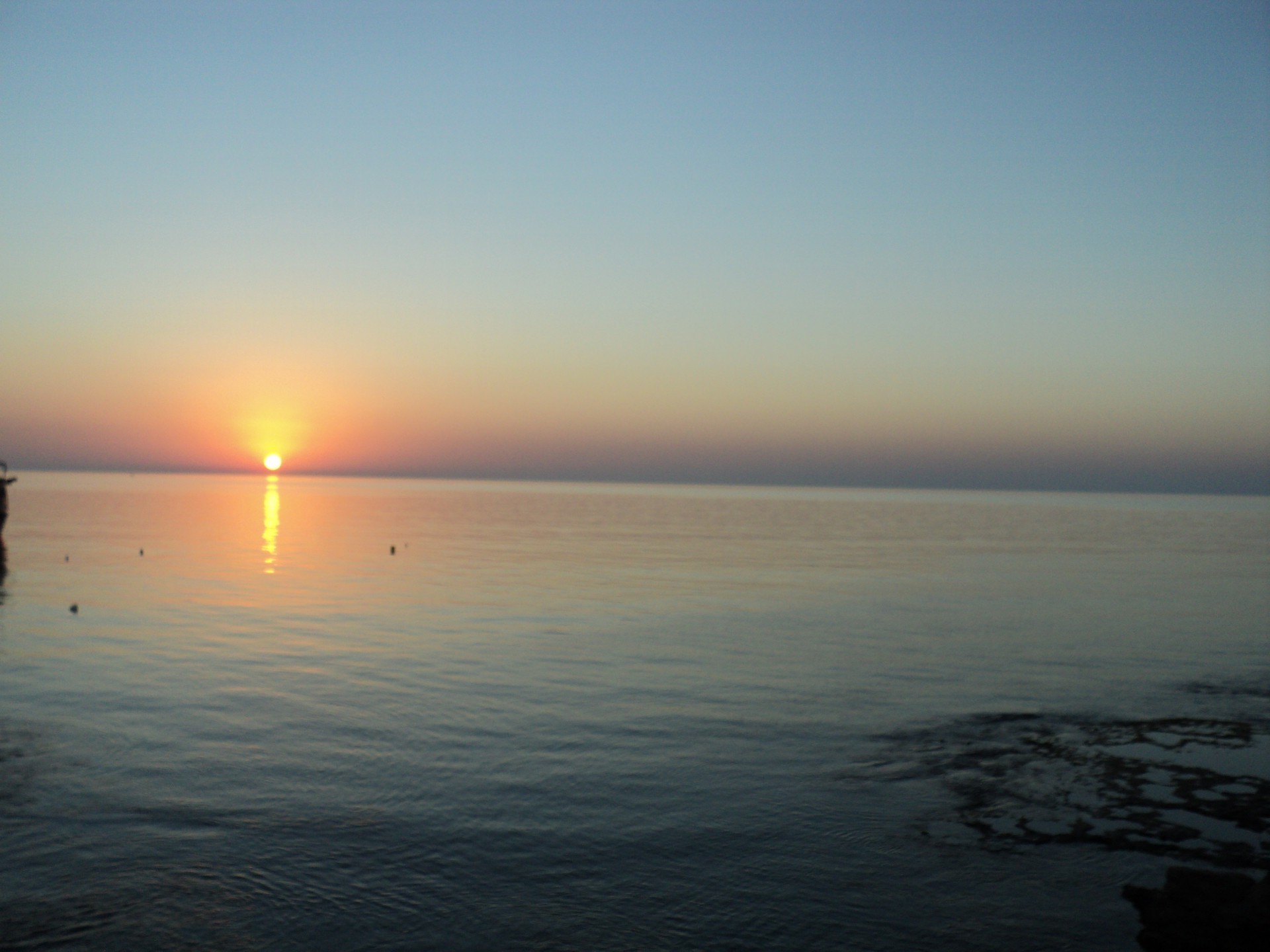 lieux célèbres coucher de soleil eau soleil aube mer plage crépuscule soir océan paysage ciel paysage beau temps lumière réflexion