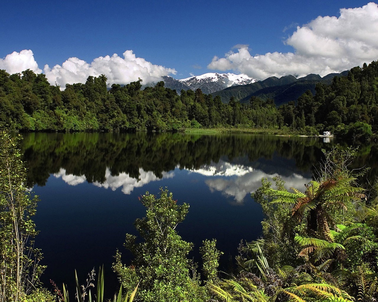 lake water nature travel reflection outdoors landscape mountain wood river sky summer composure valley tree