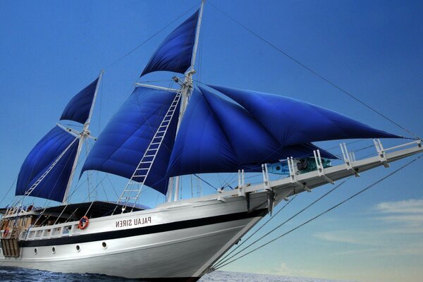 Grand yacht avec des voiles bleues