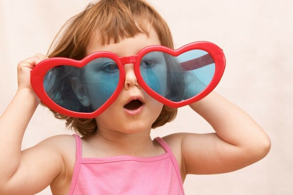 Little fashionista in red glasses