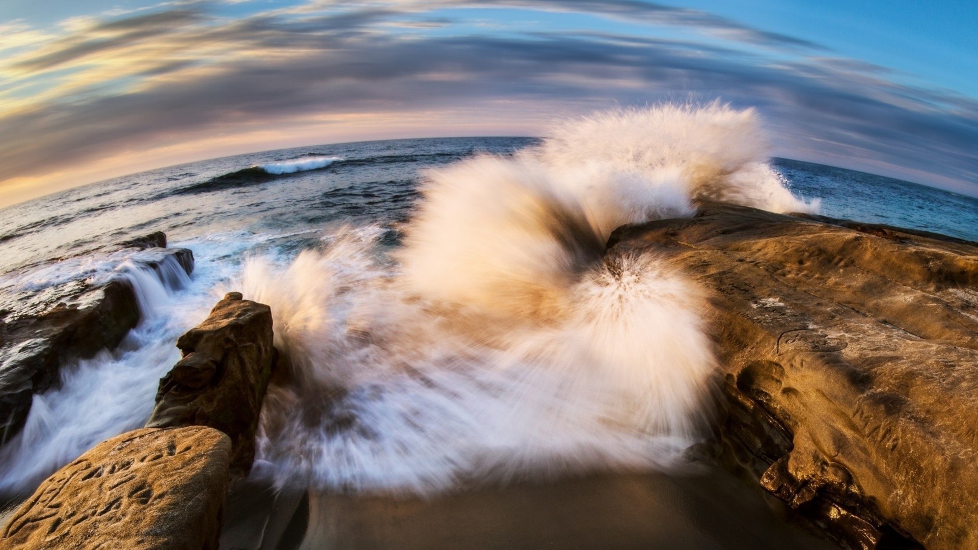 sea and ocean water winter sunset snow travel outdoors nature dawn landscape rock sky evening cold seashore ocean sea dusk beach