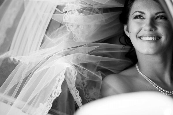 Smile of a happy bride With a veil