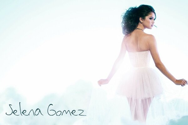 Selena Gomez in an elegant white dress