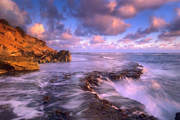 Waterfall at dusk at sunset