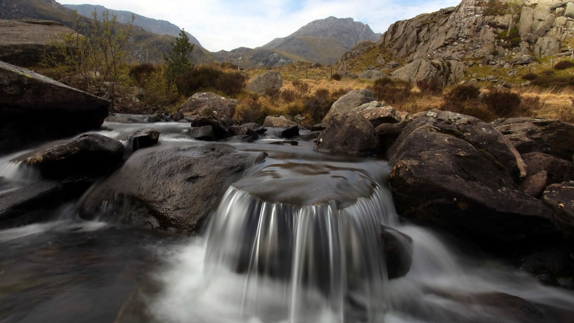 rivers ponds and streams water waterfall river stream rock nature landscape travel flow outdoors motion rapids cascade boulder mountain fall wet environment wood