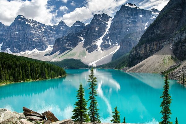 Blue lake on the background of snowy mountains