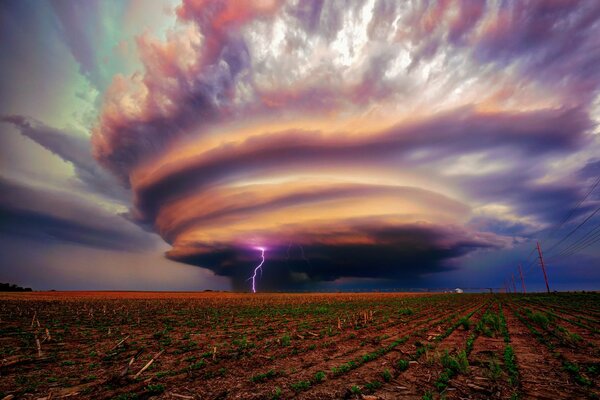 Thunderclouds with striking lightning