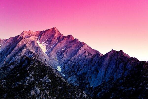 Pink sunset over high mountains