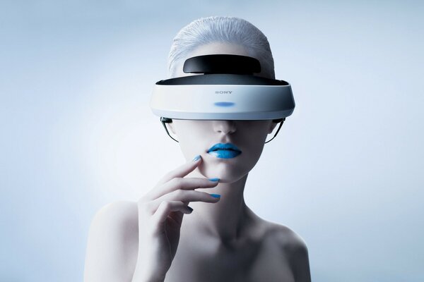 A girl with blue lips wearing virtual reality glasses