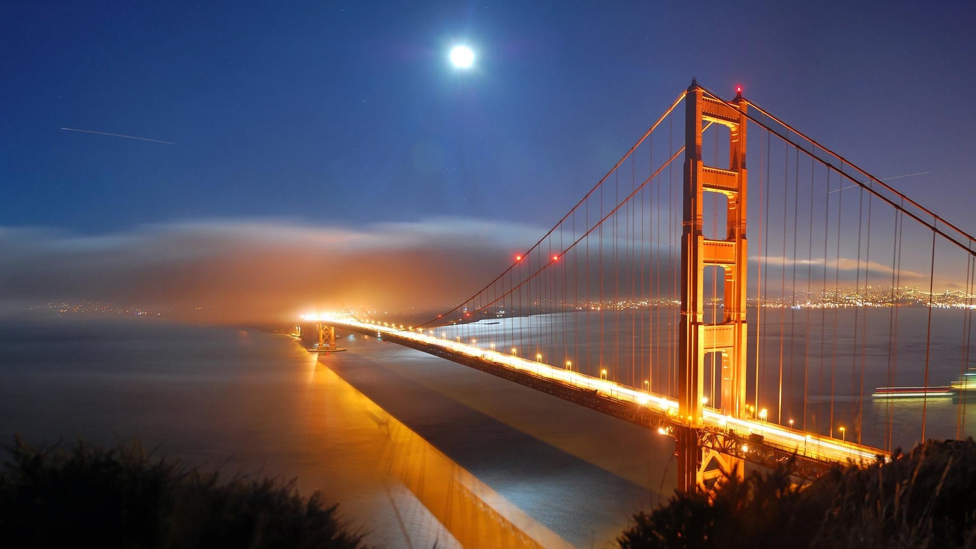 bridges bridge sunset water dusk evening architecture city sky travel river reflection suspension bridge transportation system dawn downtown