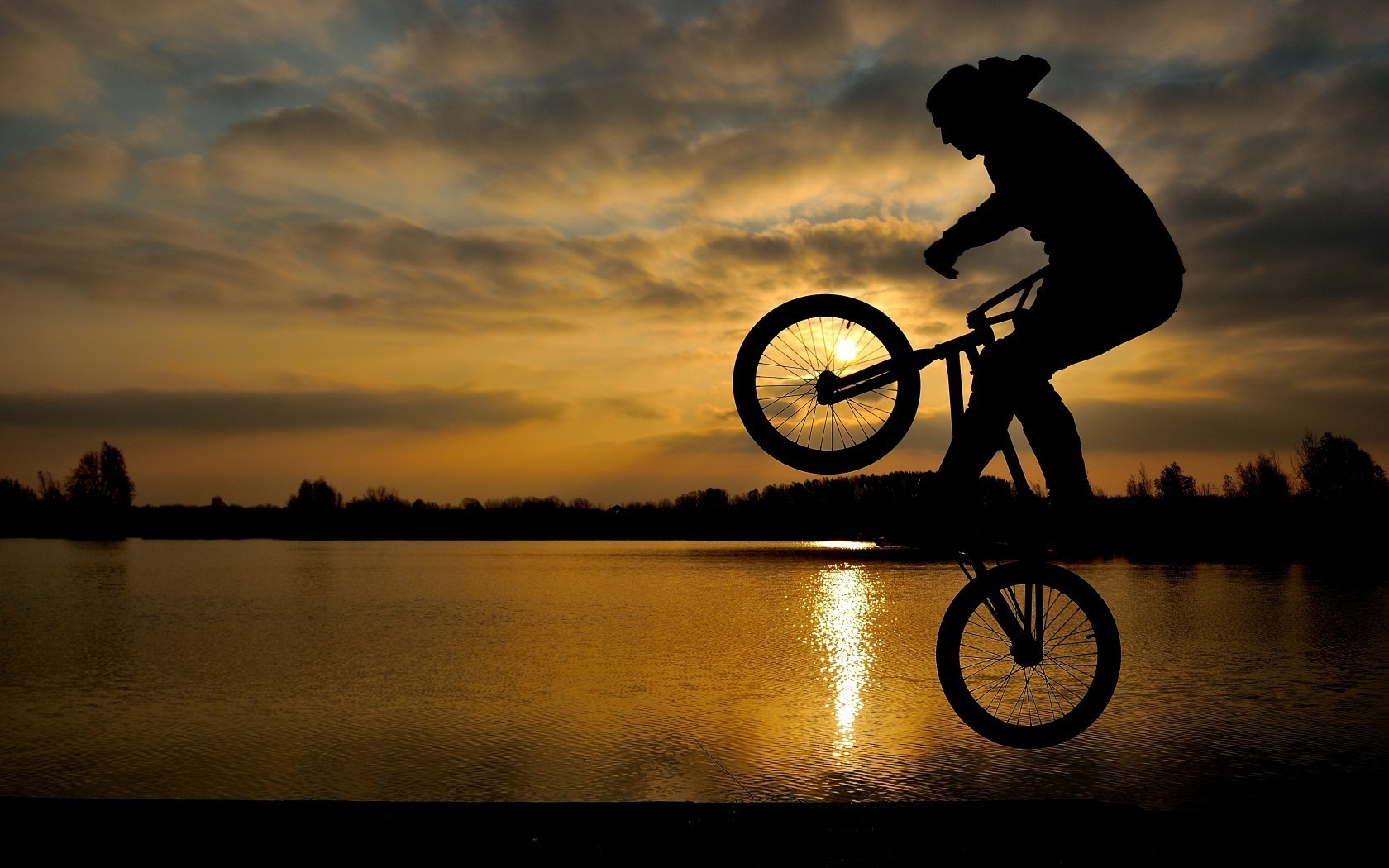 cycling sunset lake reflection dawn wheel water bike landscape silhouette cyclist river biker sky girl