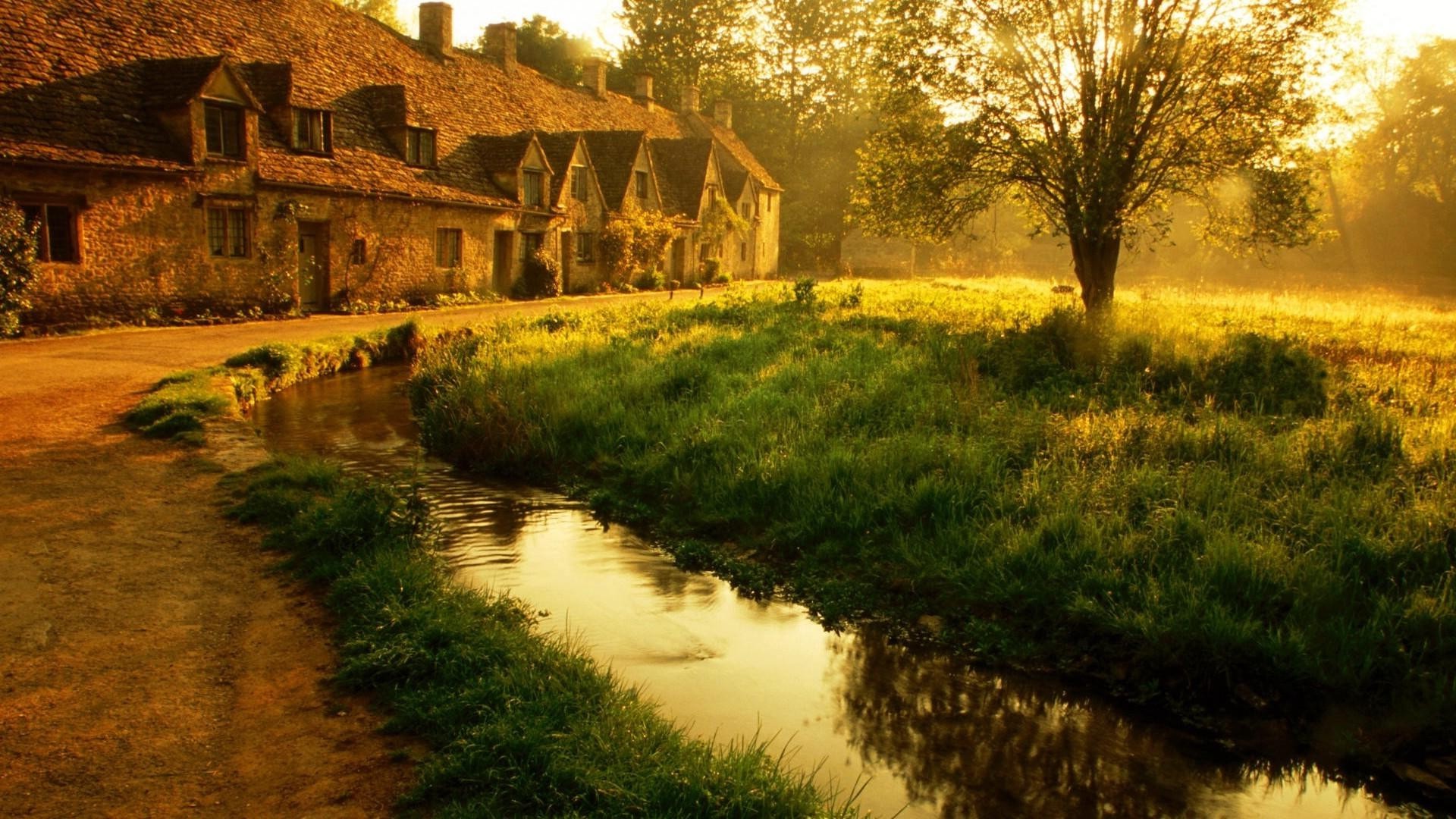 casas e chalés ao ar livre água natureza viagens árvore paisagem grama madeira campo