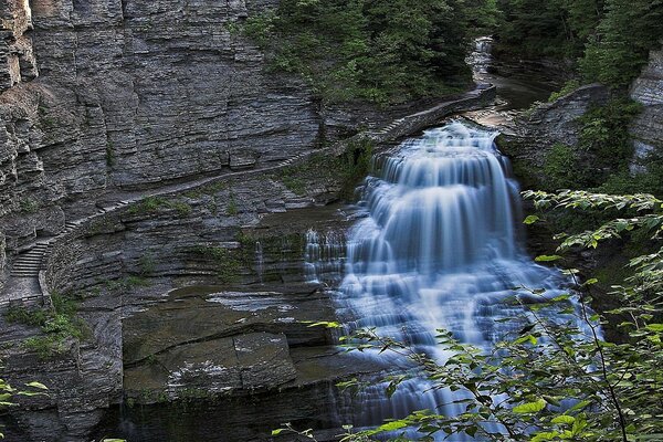 Beautiful waterfall near the cliff