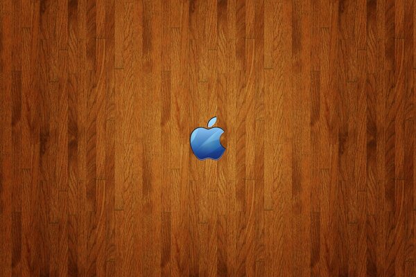 A blue apple on a woody background