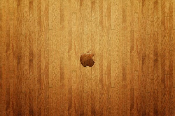 Logotipo da maçã no chão de madeira