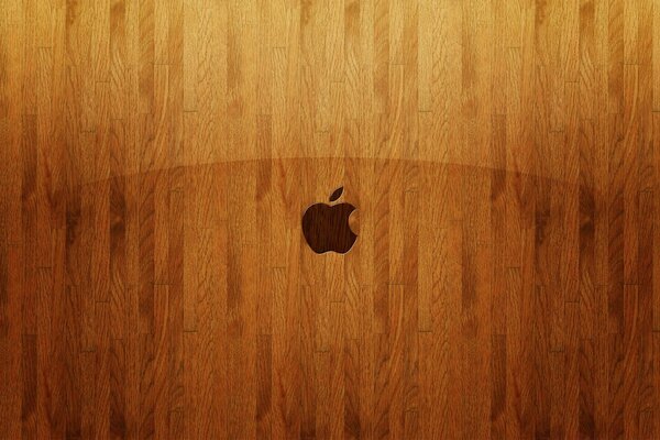 Icono de Apple en el fondo de grano de madera